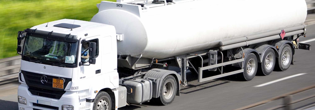 A semi truck driving on the road