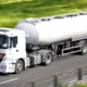 A semi truck driving on the road