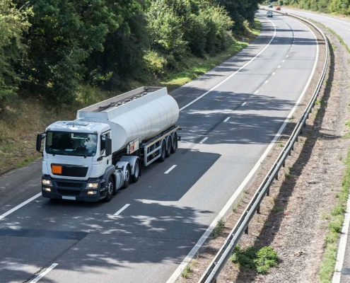 Tank truck driving down the highway