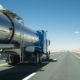 Tank truck driving down the open road