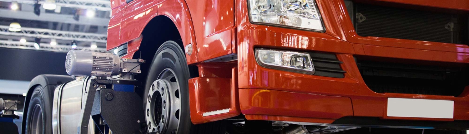 Commercial truck lifted in a repair facility