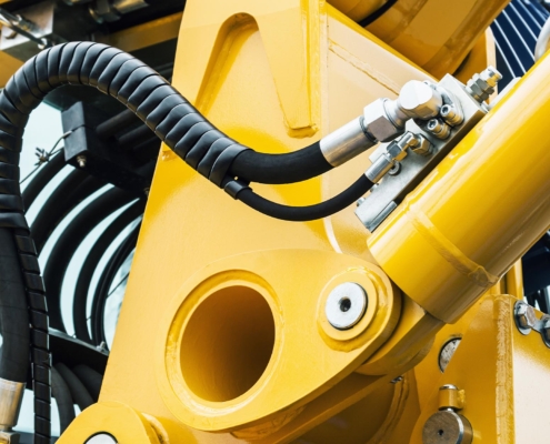 Image of a hydraulic valve attached to construction equipment