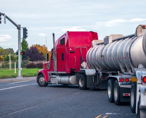 liquid tank truck marking turn at stoplight