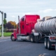 liquid tank truck marking turn at stoplight