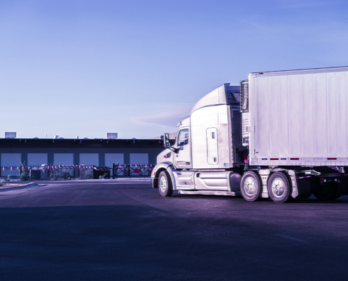 Heavy good truck arrives at warehouse